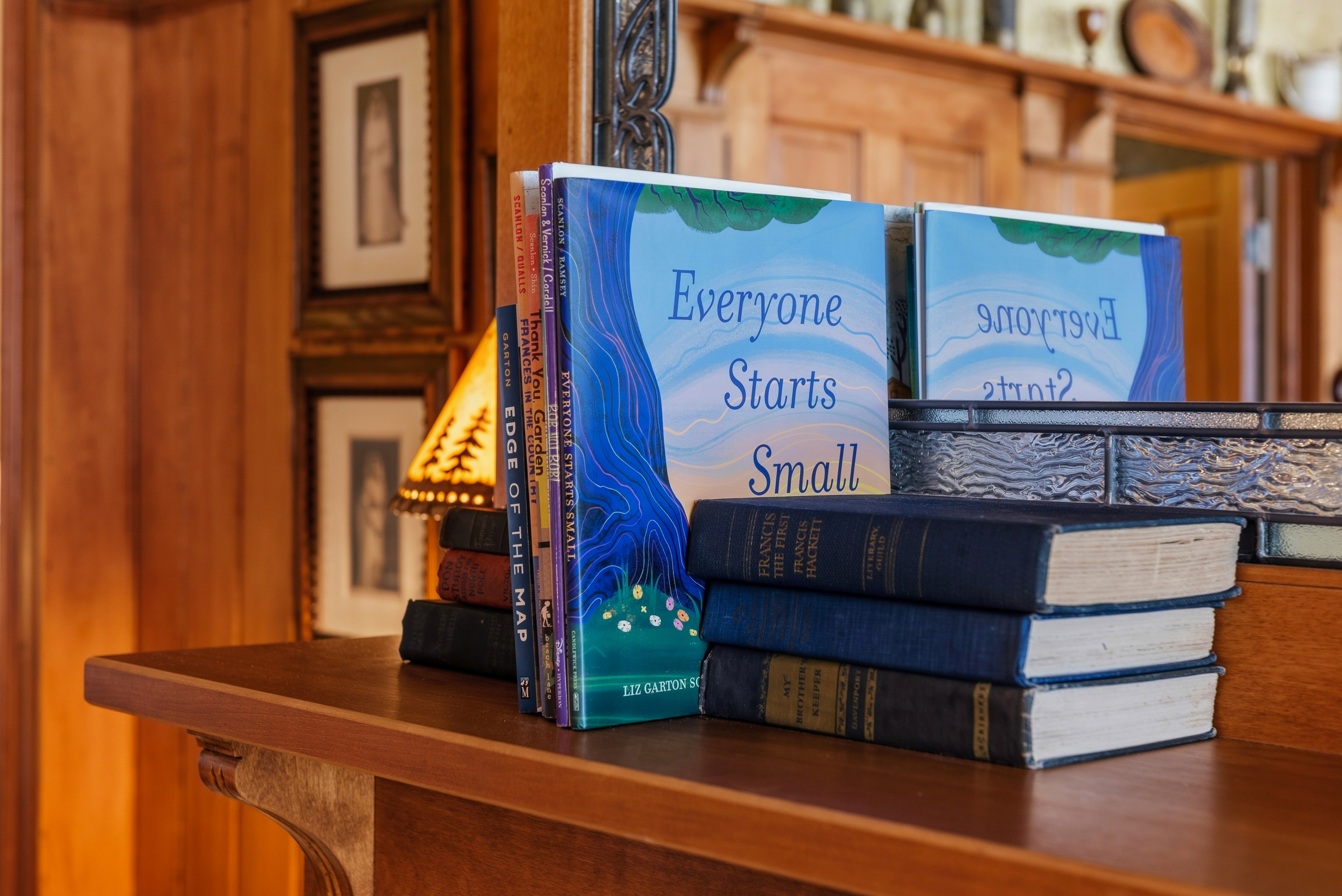 Built-in bookshelves filled w/ historic reads & character