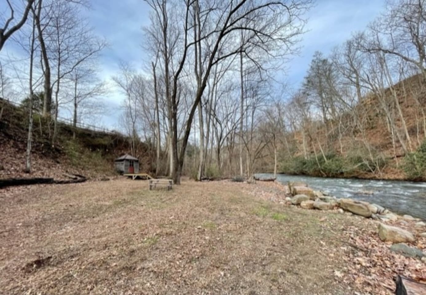 Private oasis by Spring Creek. Imagine a fire in the fire pit, playing yard games, have a picnic...