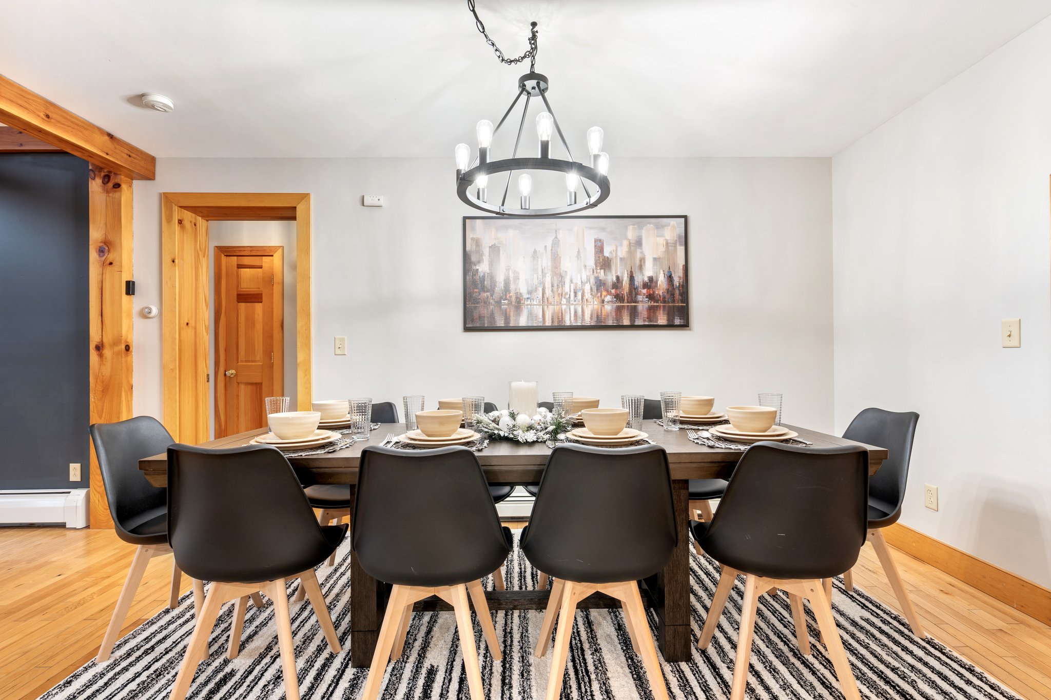 Host big group dinners around a spacious dining table designed for shared meals, celebrations, and long conversations.