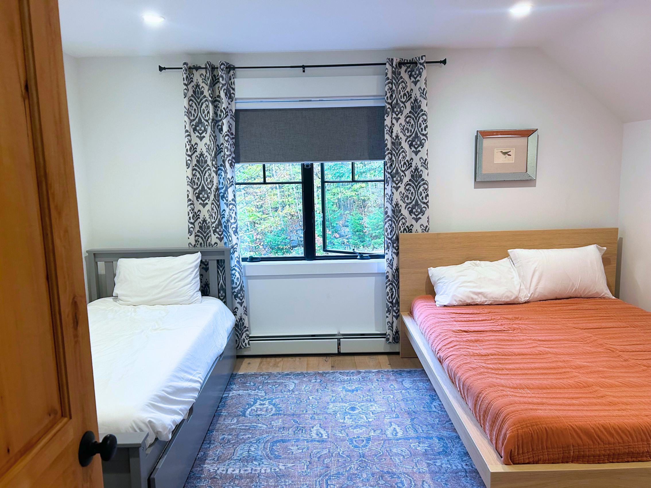 Find focus and relaxation in our versatile office space, complete with a functional desk and a cozy day bed for moments of rest