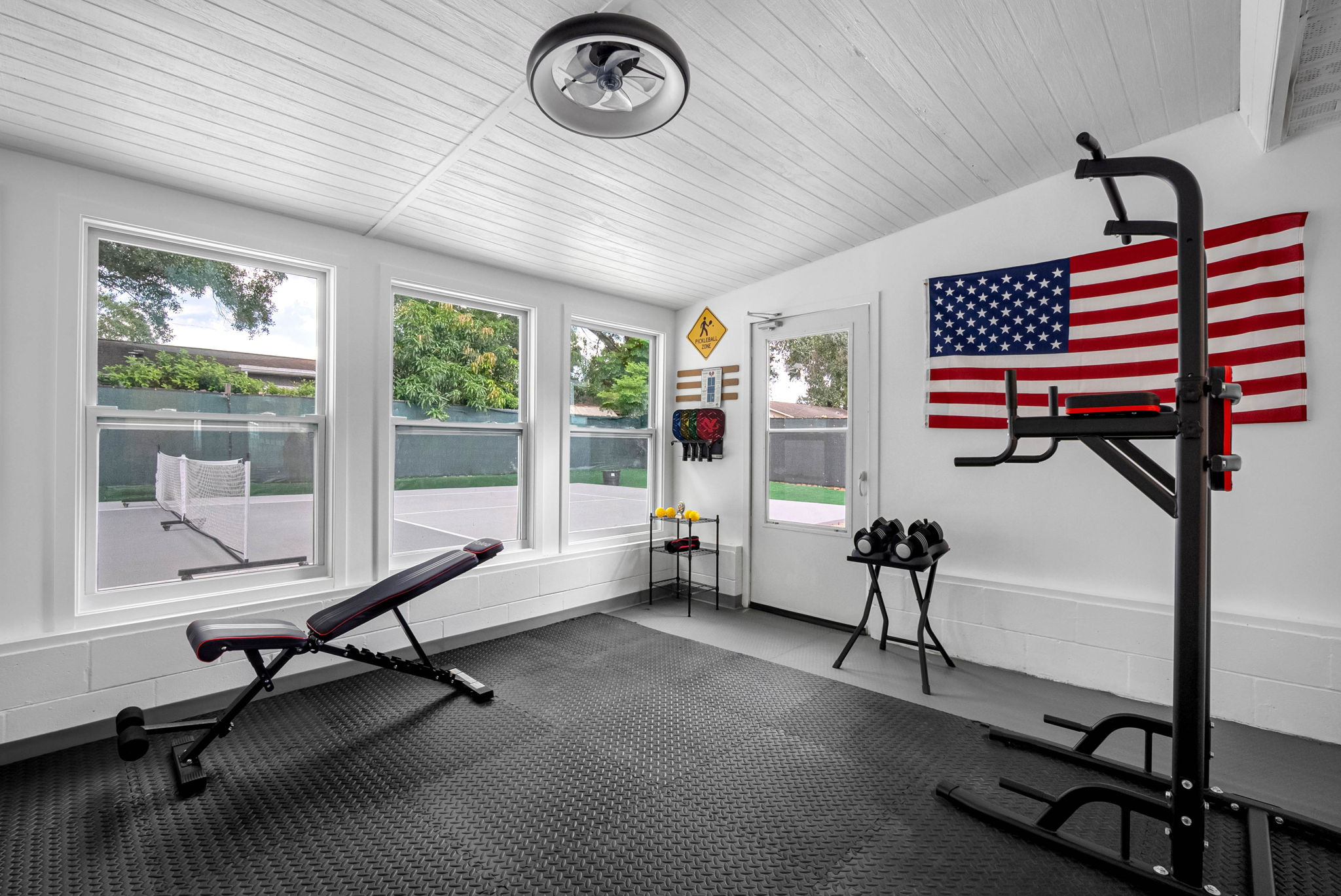 No need to skip your workout—this fully equipped home gym has everything you need to stay on track.