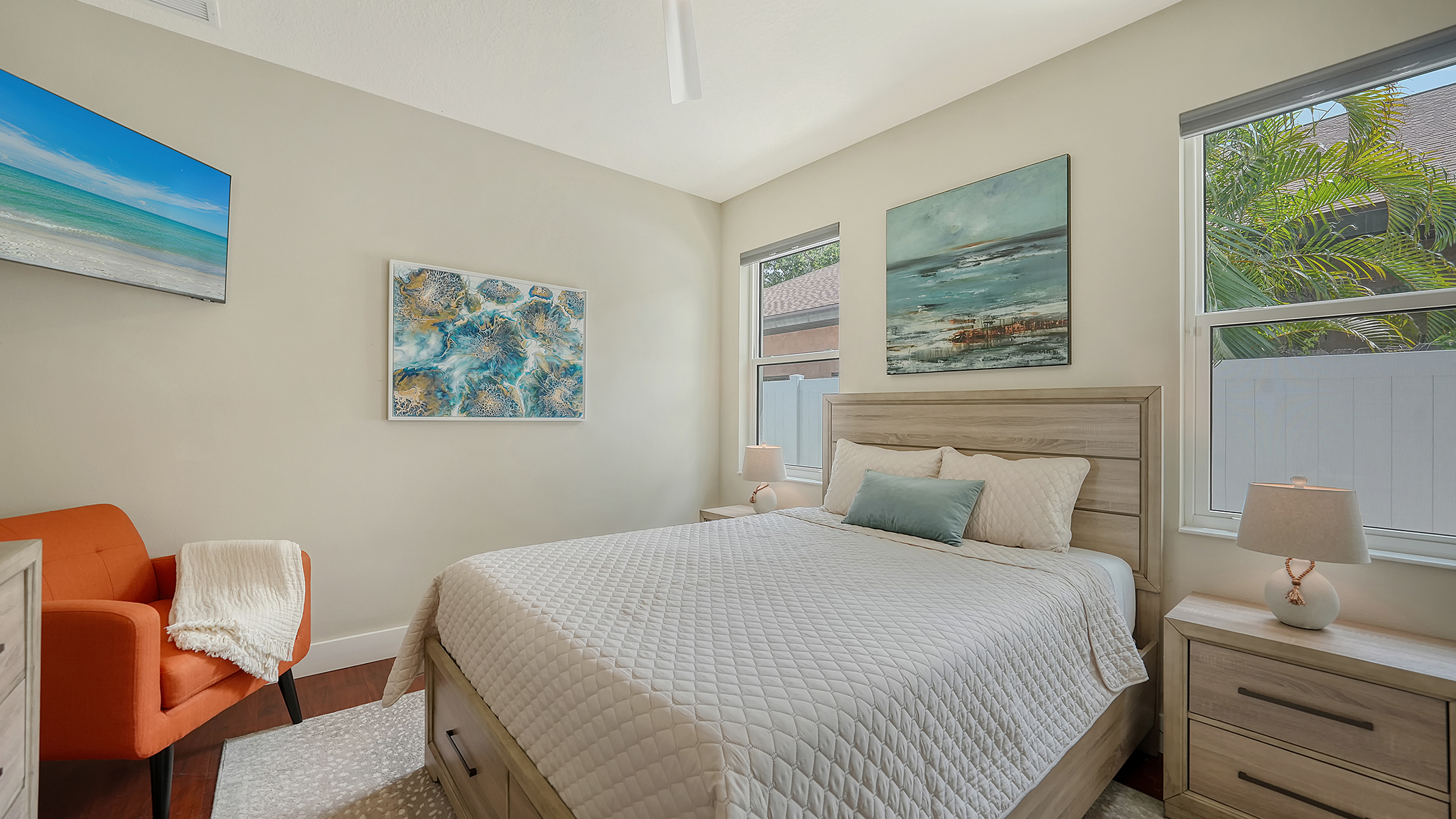 Drift off to sleep on a comfortable Serta hybrid mattress with views of the tropical plants outside the window