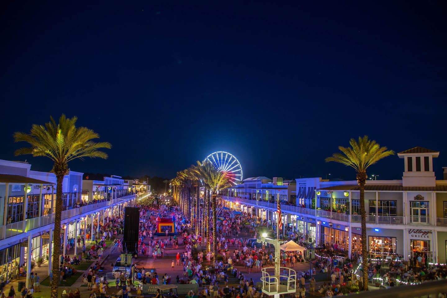 Vibrant Nightlife: Immerse yourself in the lively atmosphere and dazzling lights of The Wharf in Orange Beach!