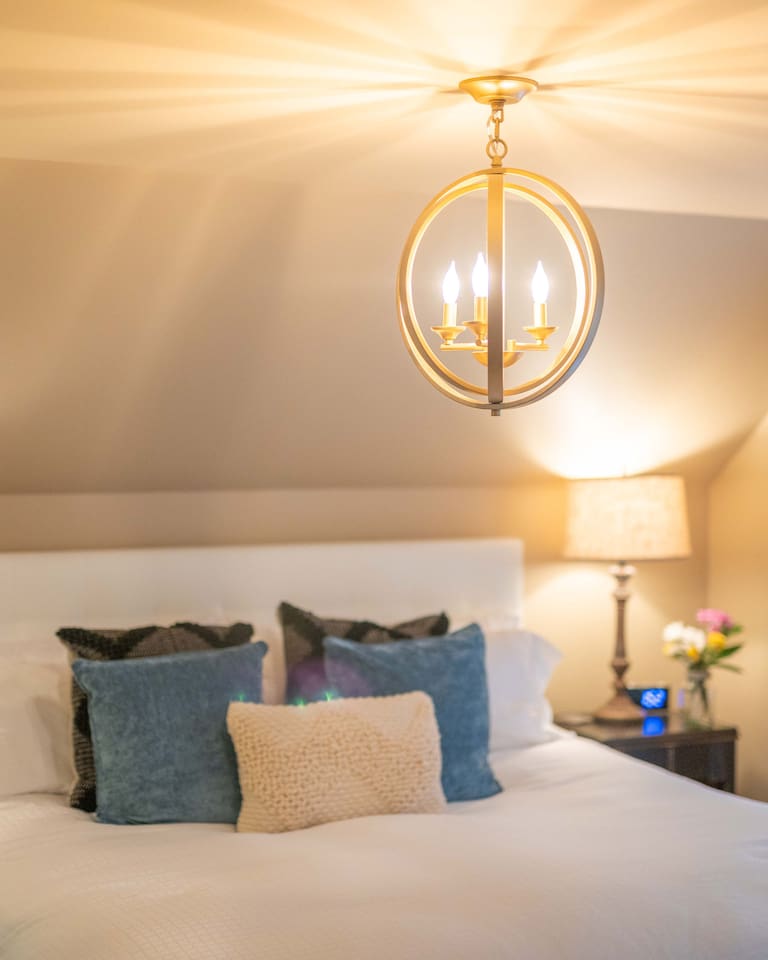 Ambient lighting designed to create a cozy and inviting atmosphere throughout the primary bedroom.