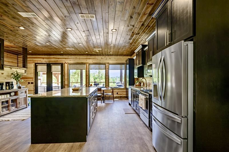 Cook, laugh, and share stories in this chef-style kitchen with premium appliances and open-concept design