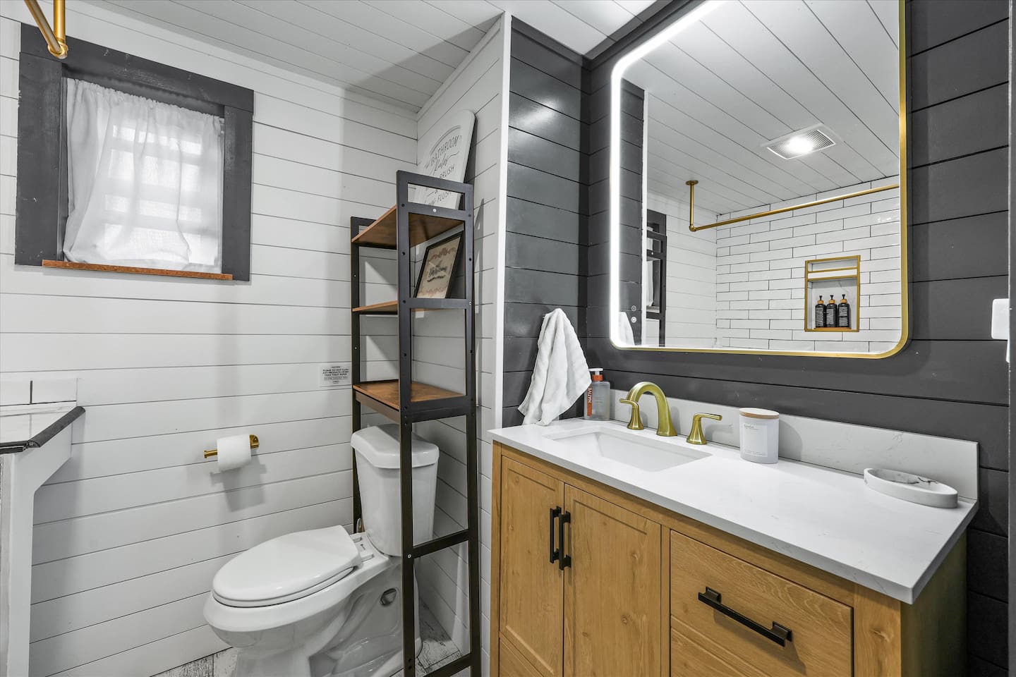 Primary ensuite bathroom with anti-fog mirror, shower only.