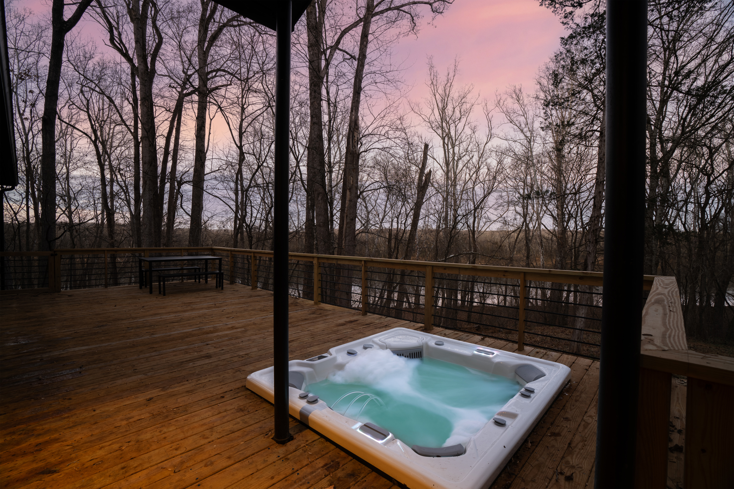 Hot Tub Oasis: Soak in the bubbles while surrounded by nature’s stunning views!