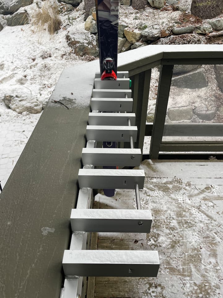 Commercial grade lockable SKI & Snowboard Racks right outside your front door on the private deck.  
These are the same SKI-KEY racks Vail uses on Whistler & Blackcomb. Narrow rack is for skis & wider rack is for snowboards or extra wide skis.  