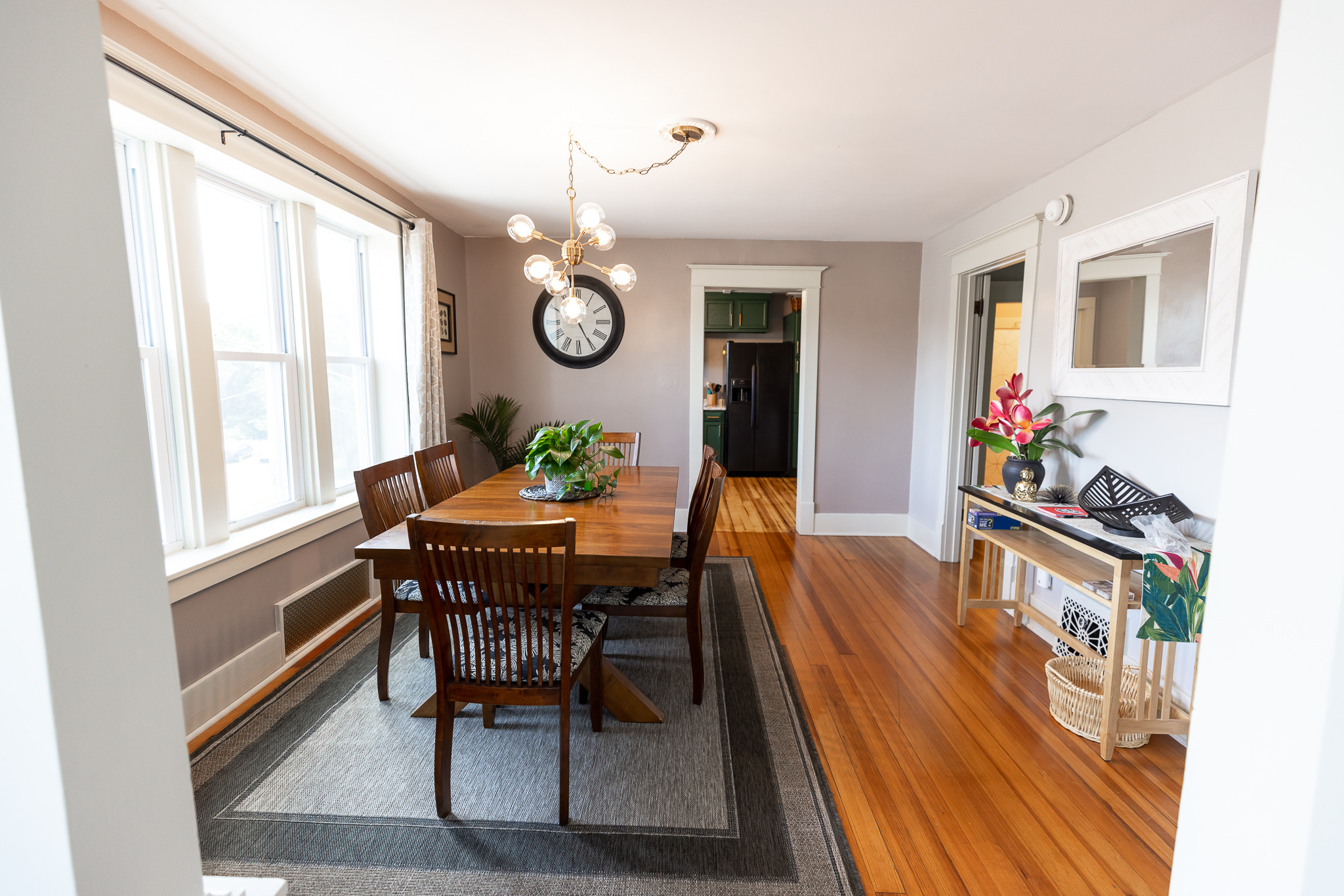 Gather around the large dinning room table that easily seats 6 guests for games or meals.  There are cards and a few games on the entry table shelf to enjoy.