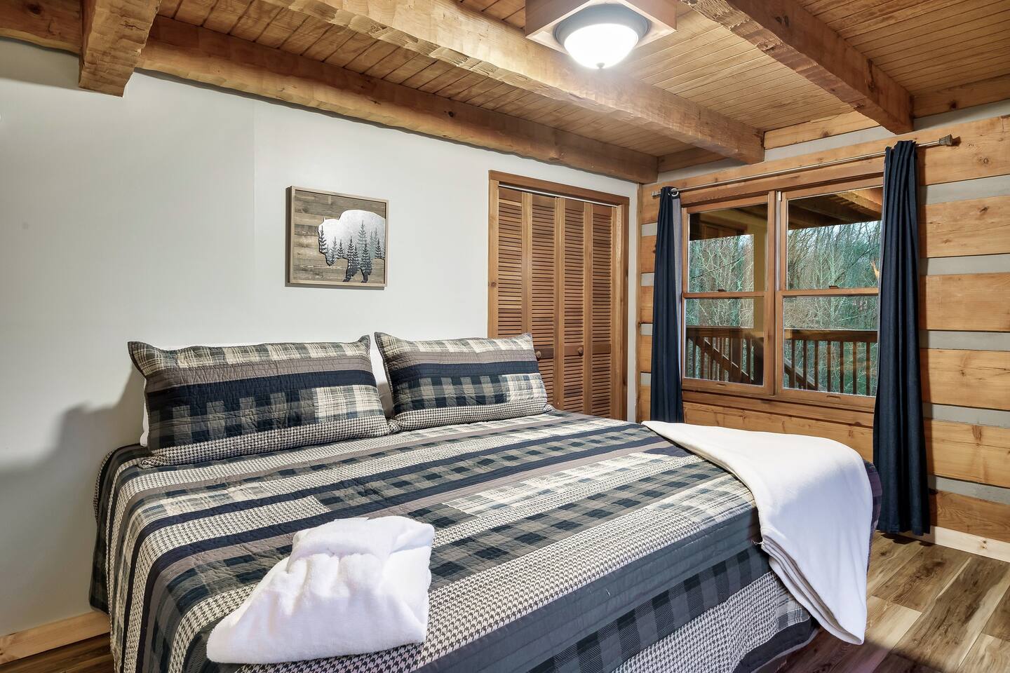 Our main floor master features the comfort of a Zinus 12" memory foam mattress and faces that gorgeous view of the mountains! Put it this way: If you are the one to pay, this is the room you should choose to stay!