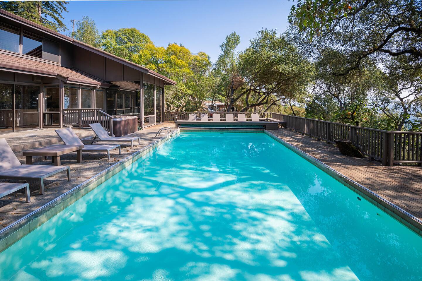 Saltwater pool is gas-heated and comfortable for swimming all year. Around the pool are 10 lounge chairs.