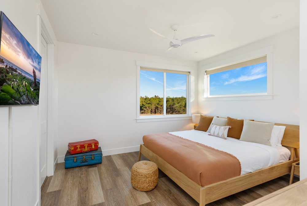 Upstairs Primary bedroom with ensuite bath, heated bathroom floors & shower.