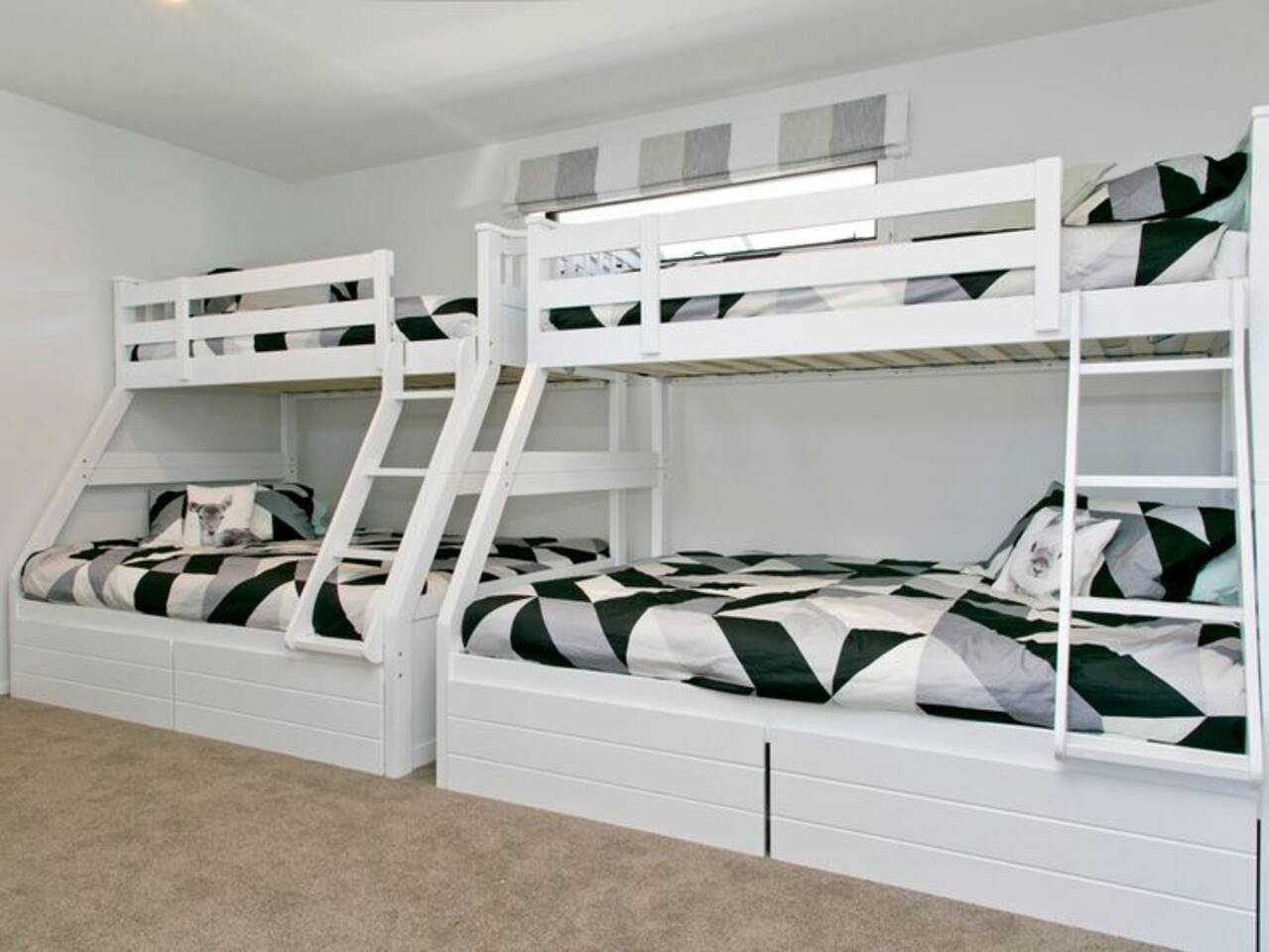 Bunk room , doubles on the bottom and single on the top. There's also a TV on the wall!