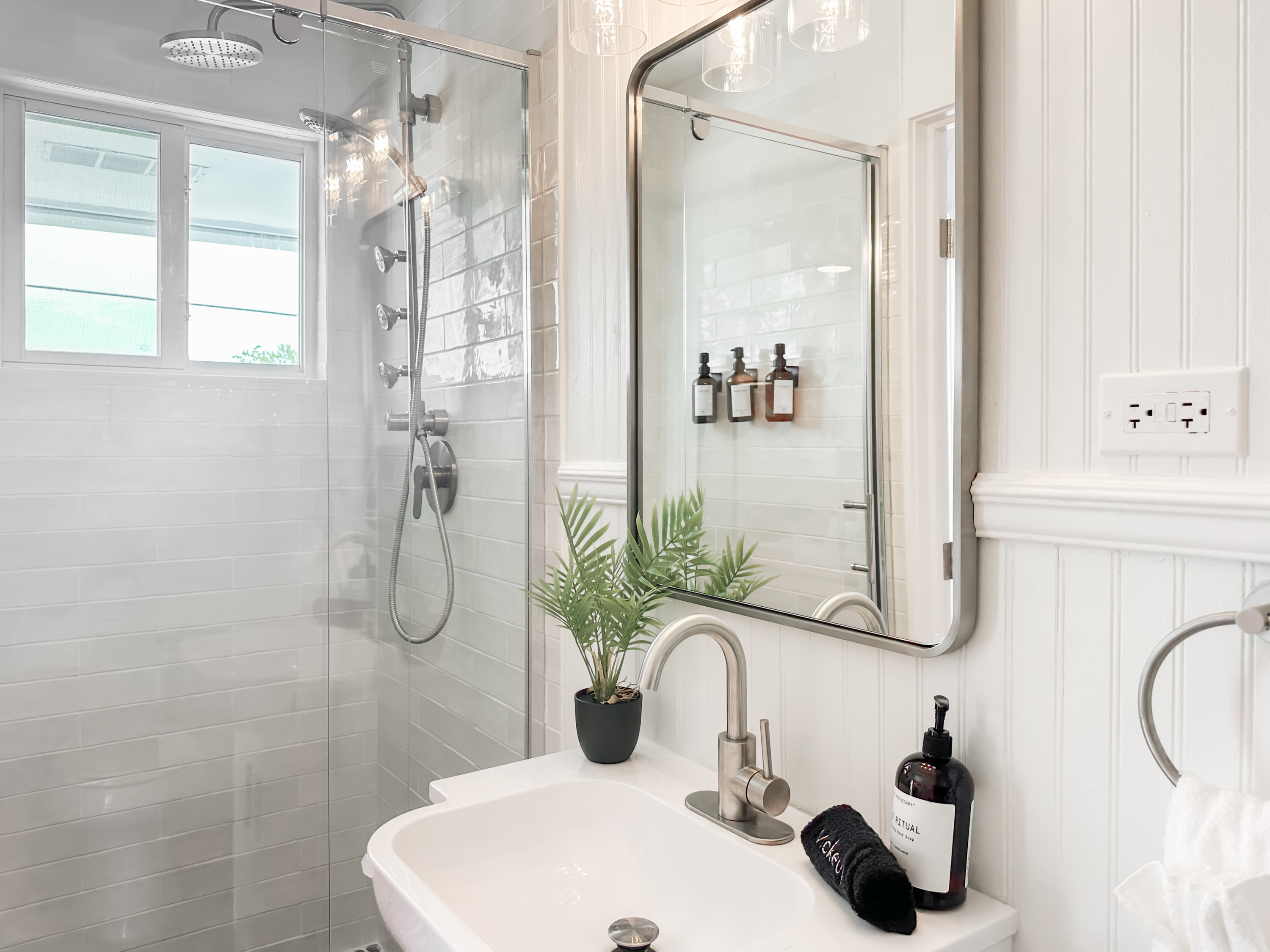 With a rainfall / spa shower feature.