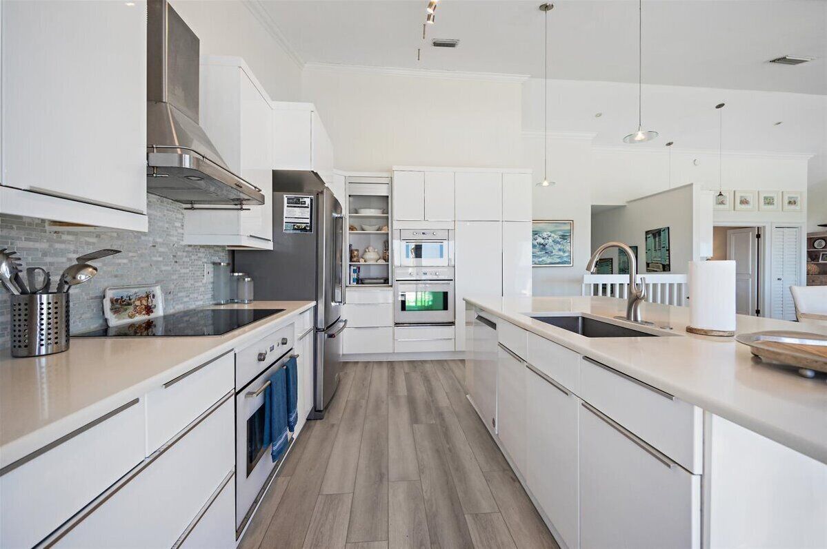 Bright kitchen that is very well stocked with any cooking item you should need