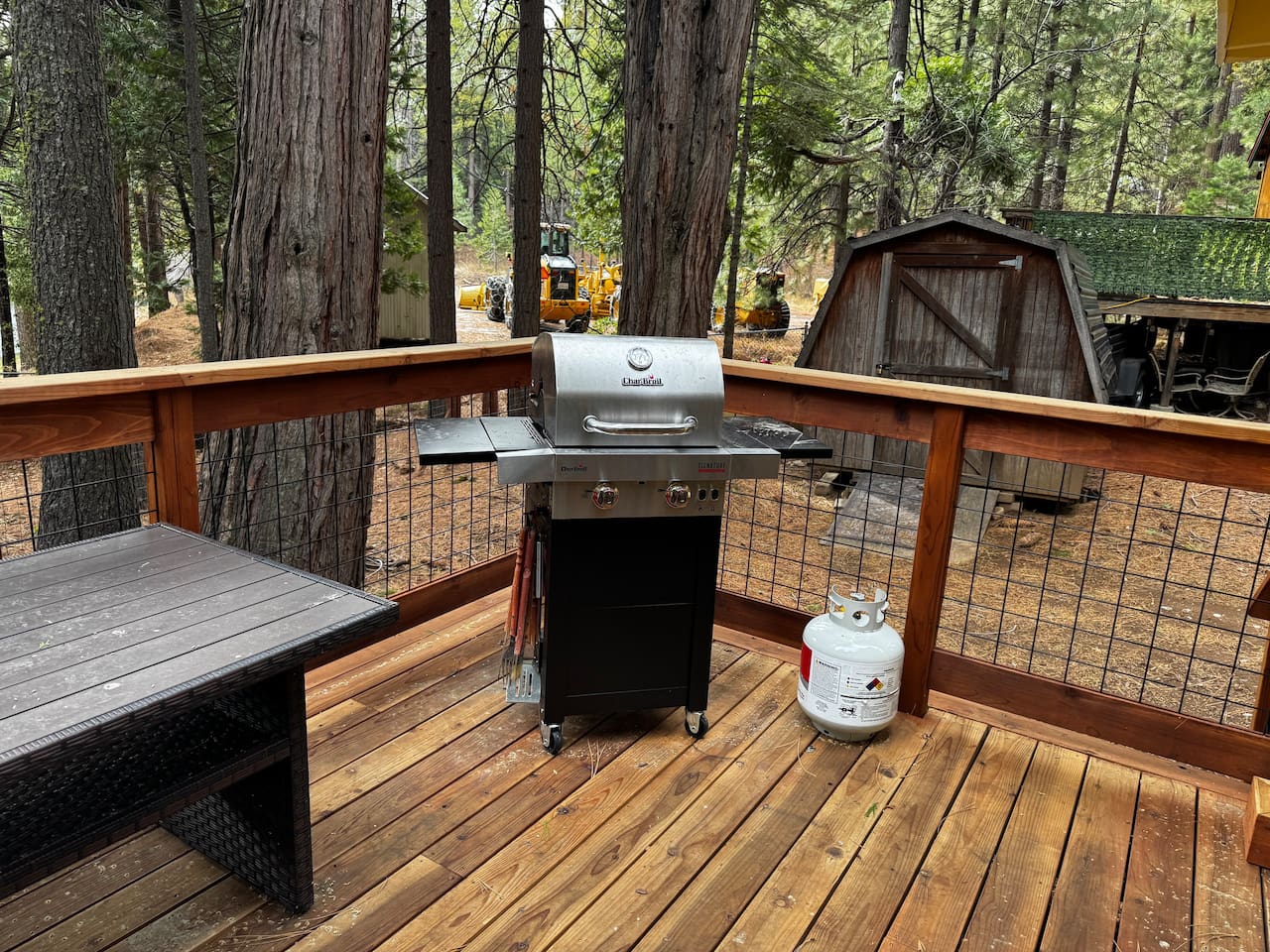 Cook on our propane grill (propane provided), plenty of BBQ tools and even an extra table for prep and serving. 