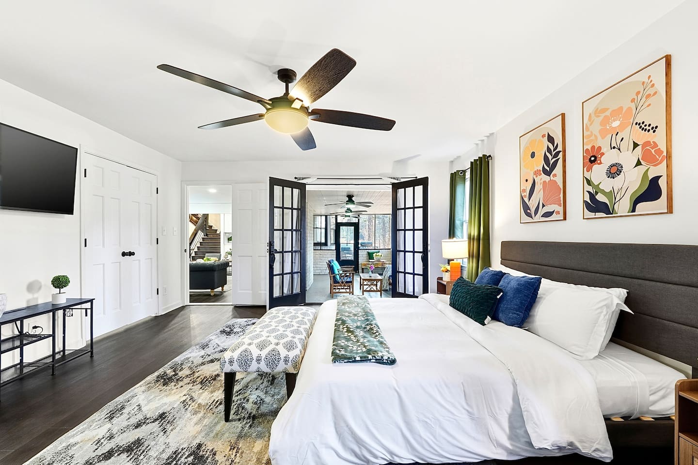 Spacious first-floor master bedroom located to the far right as you enter through the front door. This earthy, calming retreat features a king bed and smart TV. This room includes 2 full-body towels, 2 washcloths, and 2 hand towels for your stay.