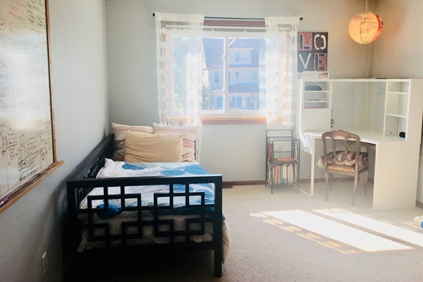 Sleeping area, desk and workspace.