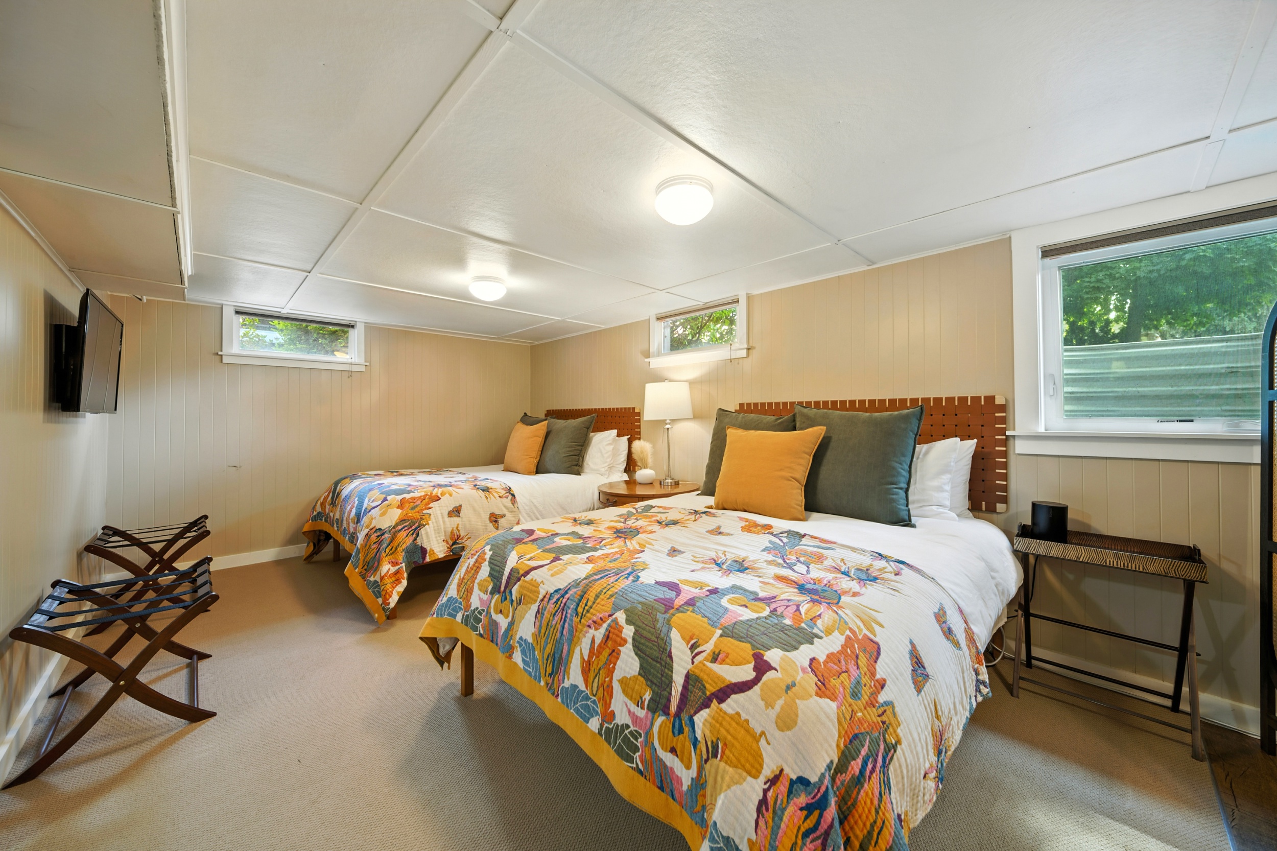Bedroom #3 of 3: open basement with 2 queen beds, Smart TV, Pac-Man and washer & dryer (not pictured)
