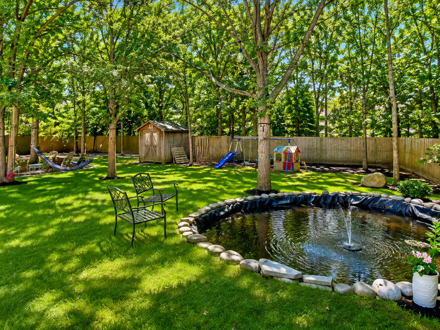 Tranquil backyard pond with fountain