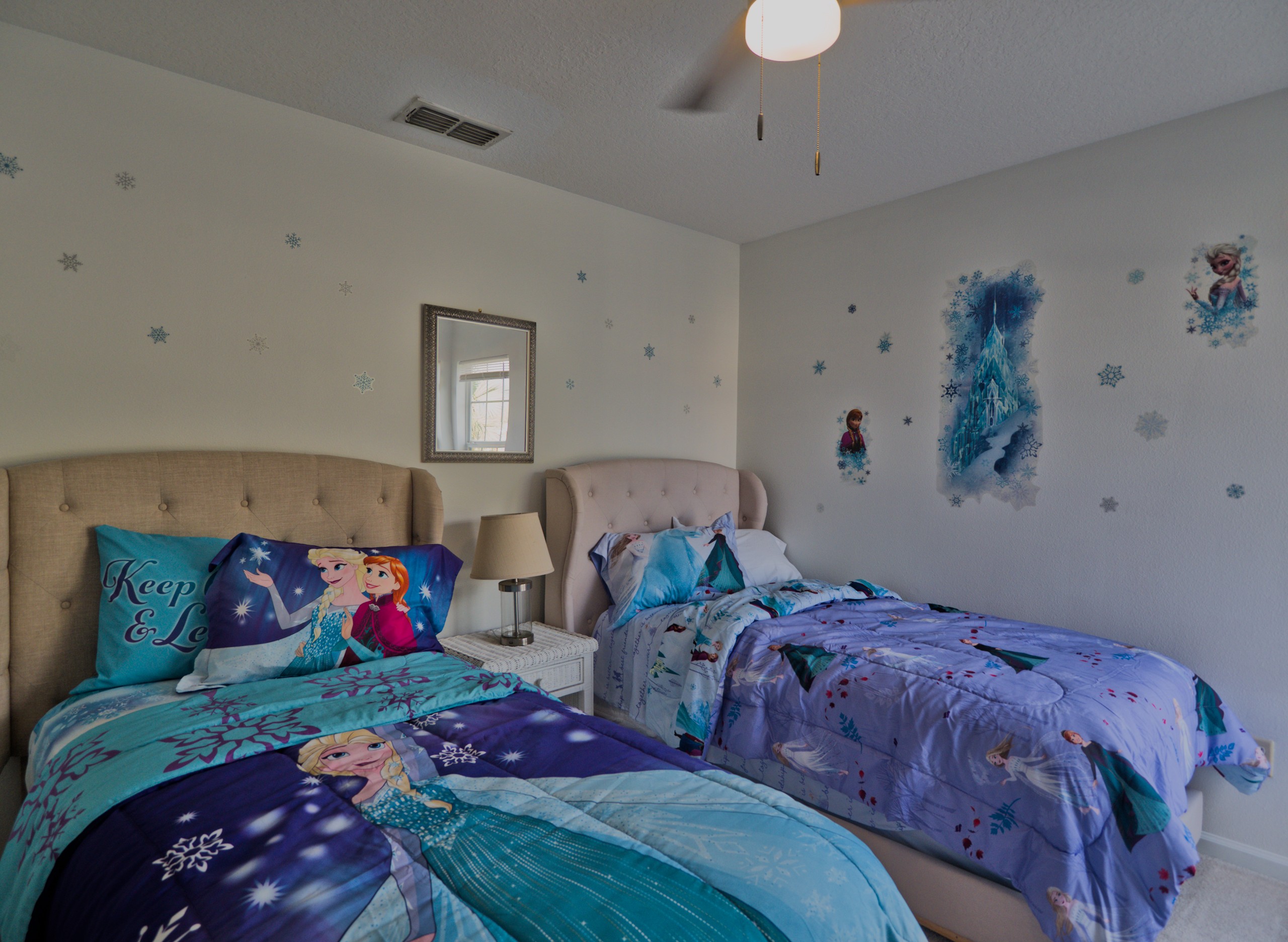 Frozen room with two twin beds.