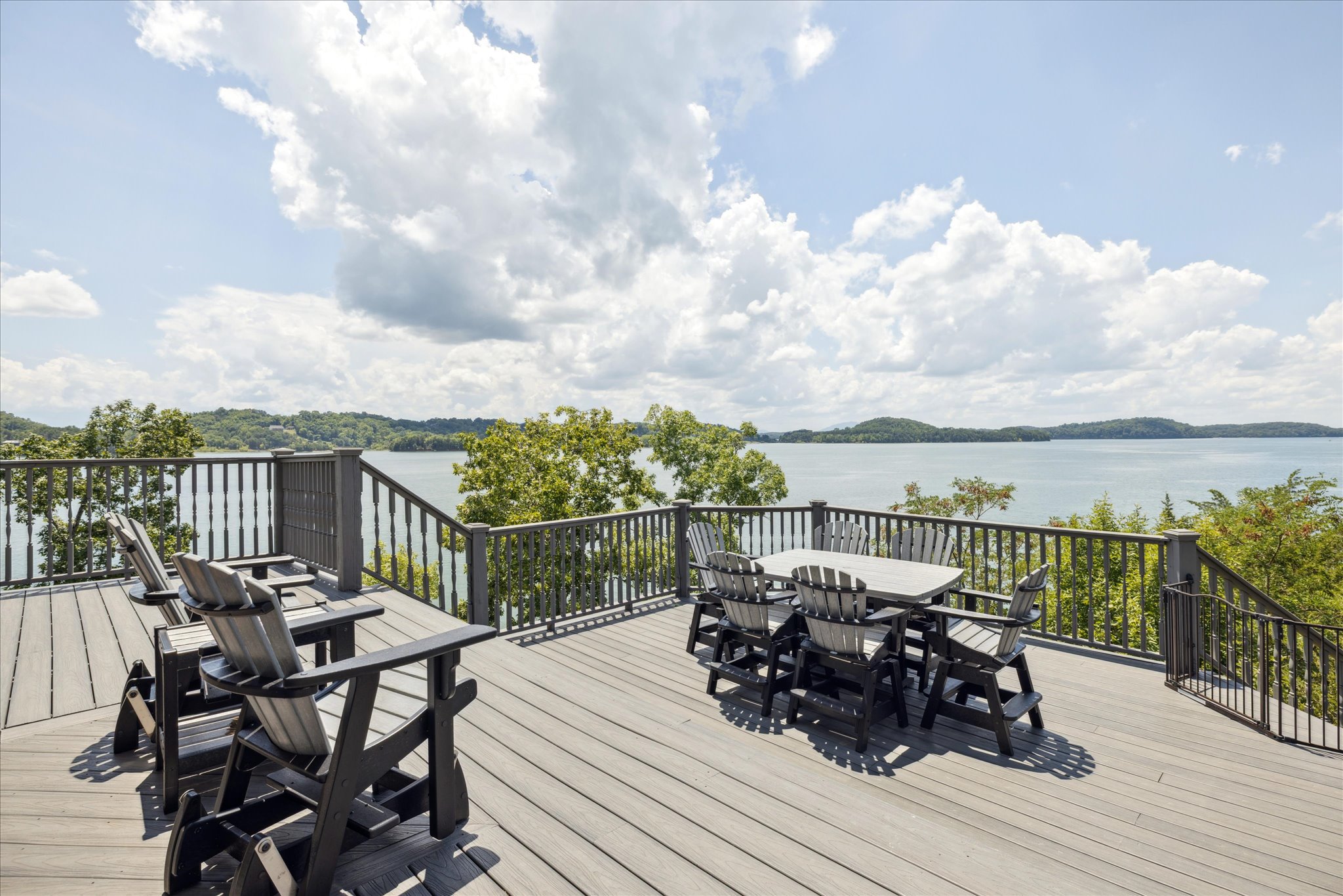 Back Deck (~32 x 21 ft) overlooking Douglas lake on 2 sides of deck