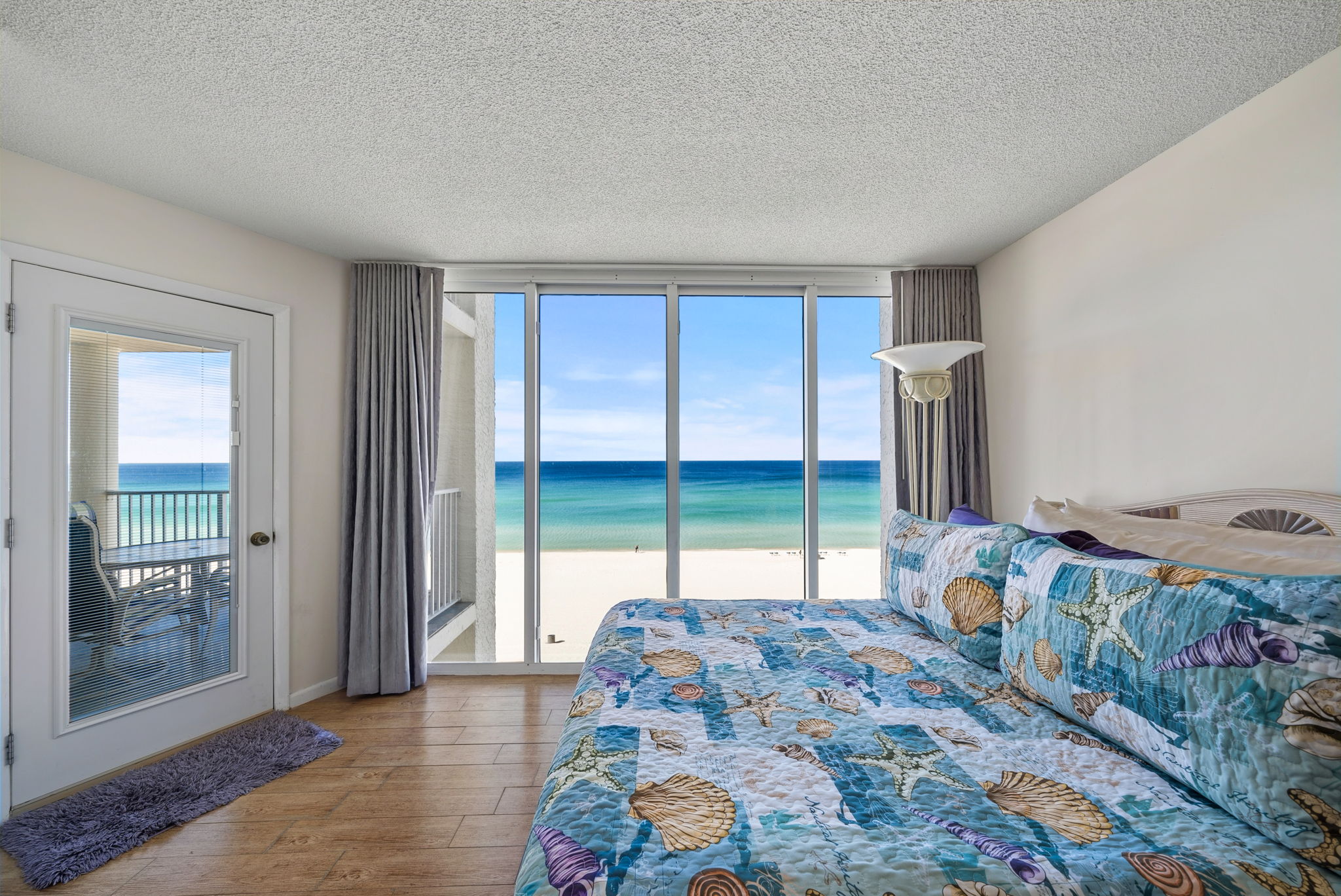 Two queen bedroom with floor to ceiling views of the Gulf and private balcony access