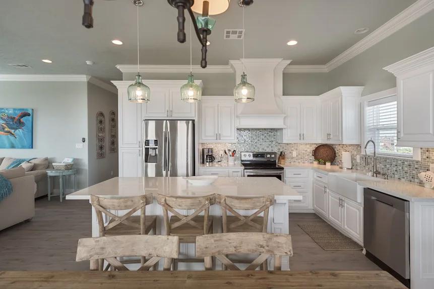 This kitchen invites you to create lasting memories with a large island perfect for prepping, casual dining, or catching up with loved ones.