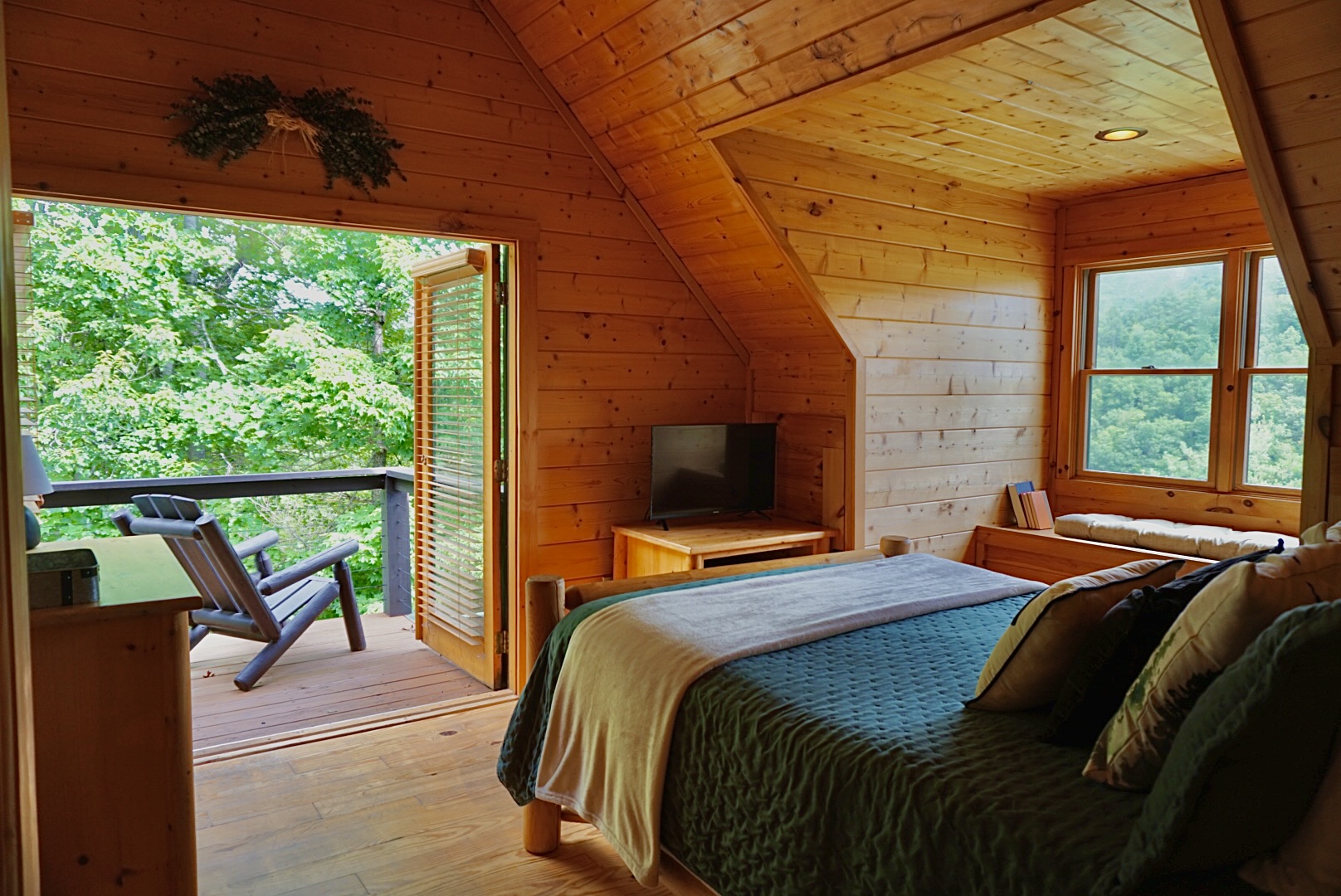 Charming Loft: Unwind in a tranquil space with stunning views and warm wood accents!
