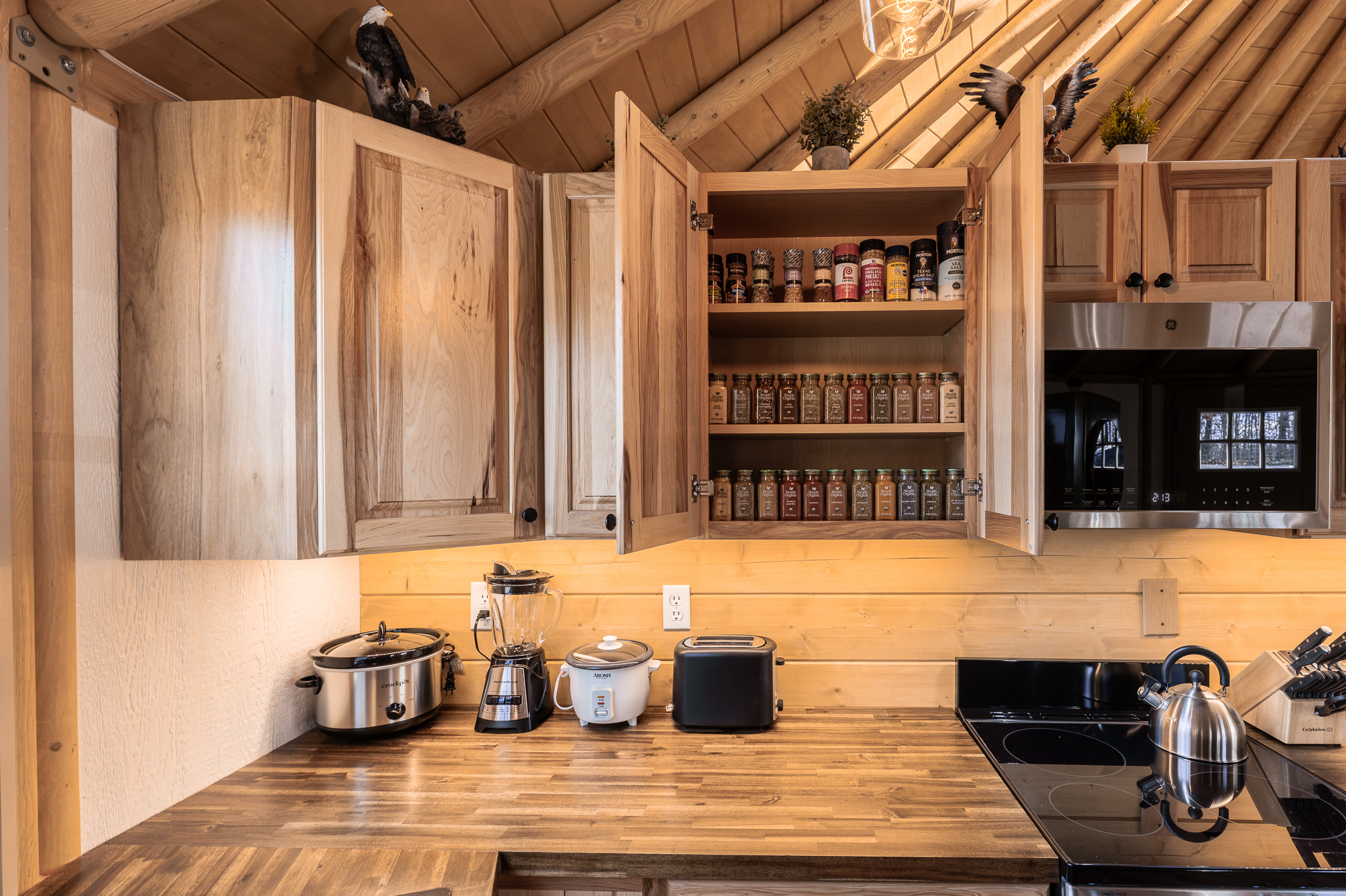 Thoughtfully stocked kitchen details, including spices and essentials—perfect for cooking relaxed meals or enjoying a quiet, romantic night in.