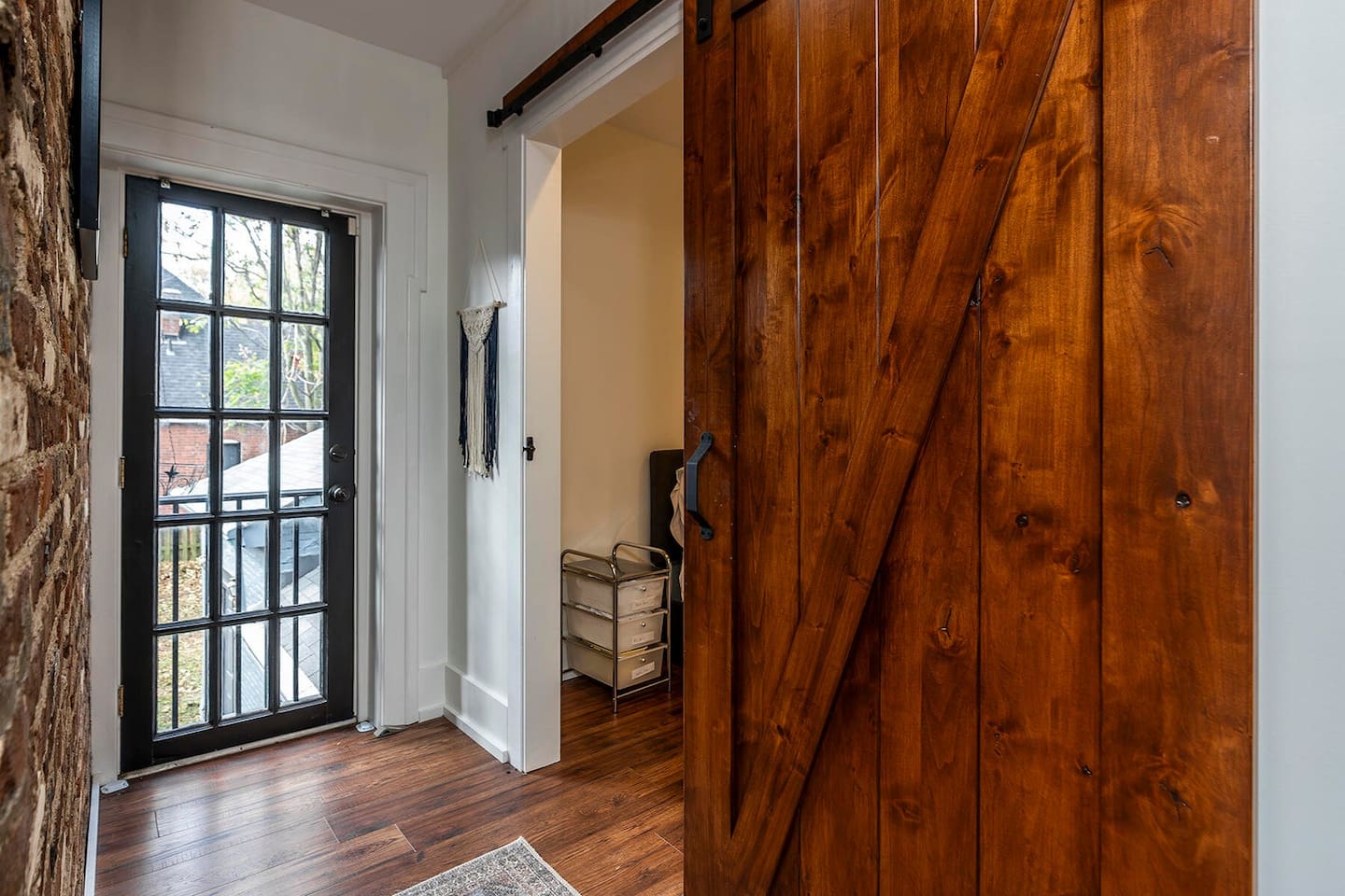 Sliding door to the Photographer's Suite and view of the backyard. (Only accessible to guests of the Bell-Smith Suite)
