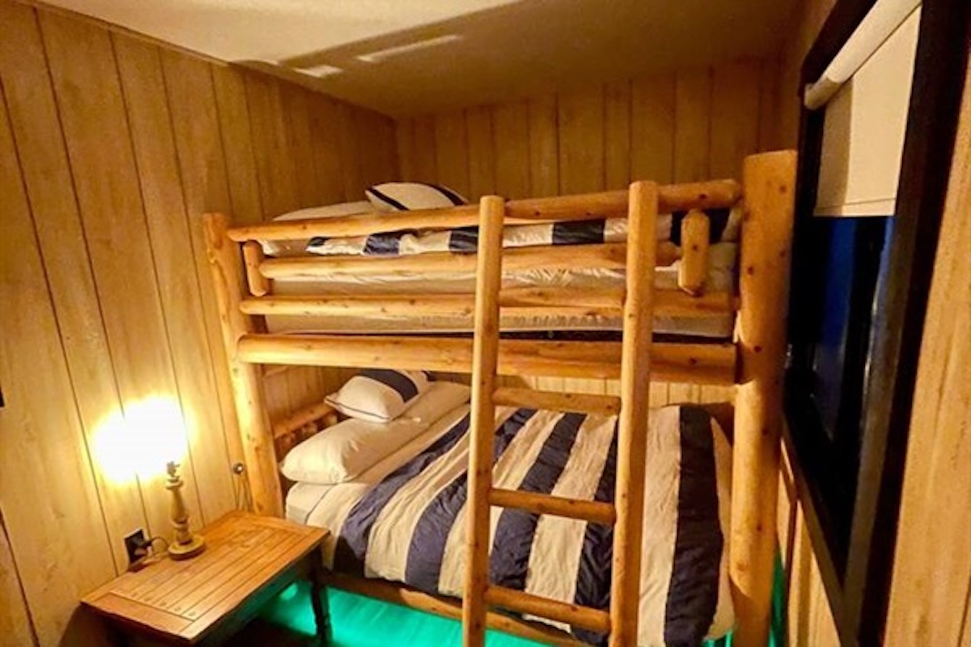 Bunk room with multiple sleeping spaces for families and groups
