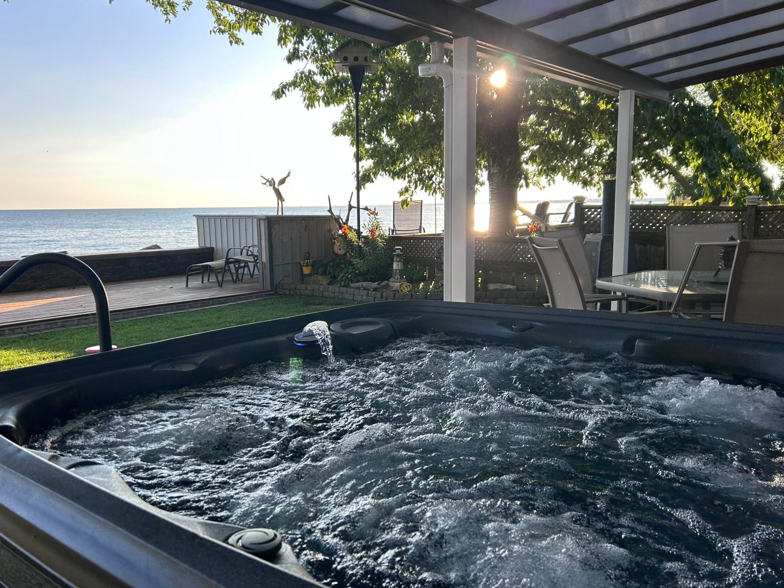 Unwind in the hot tub with Lake Erie as your backdrop.