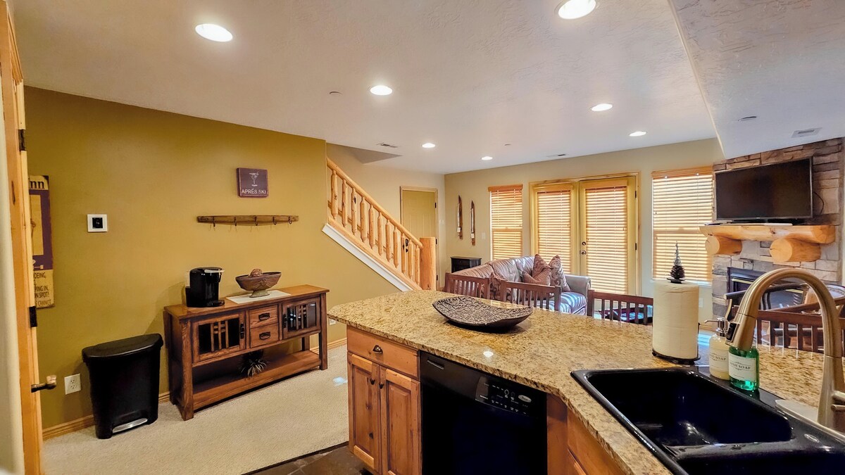 Experience seamless communication with friends and guests in the open-concept floor plan.