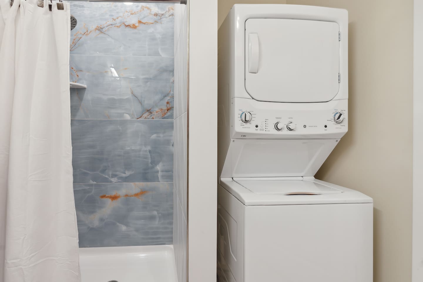 Washer and Dryer in the hall bathroom or Bathroom 2. Supplies in the cabinets. 