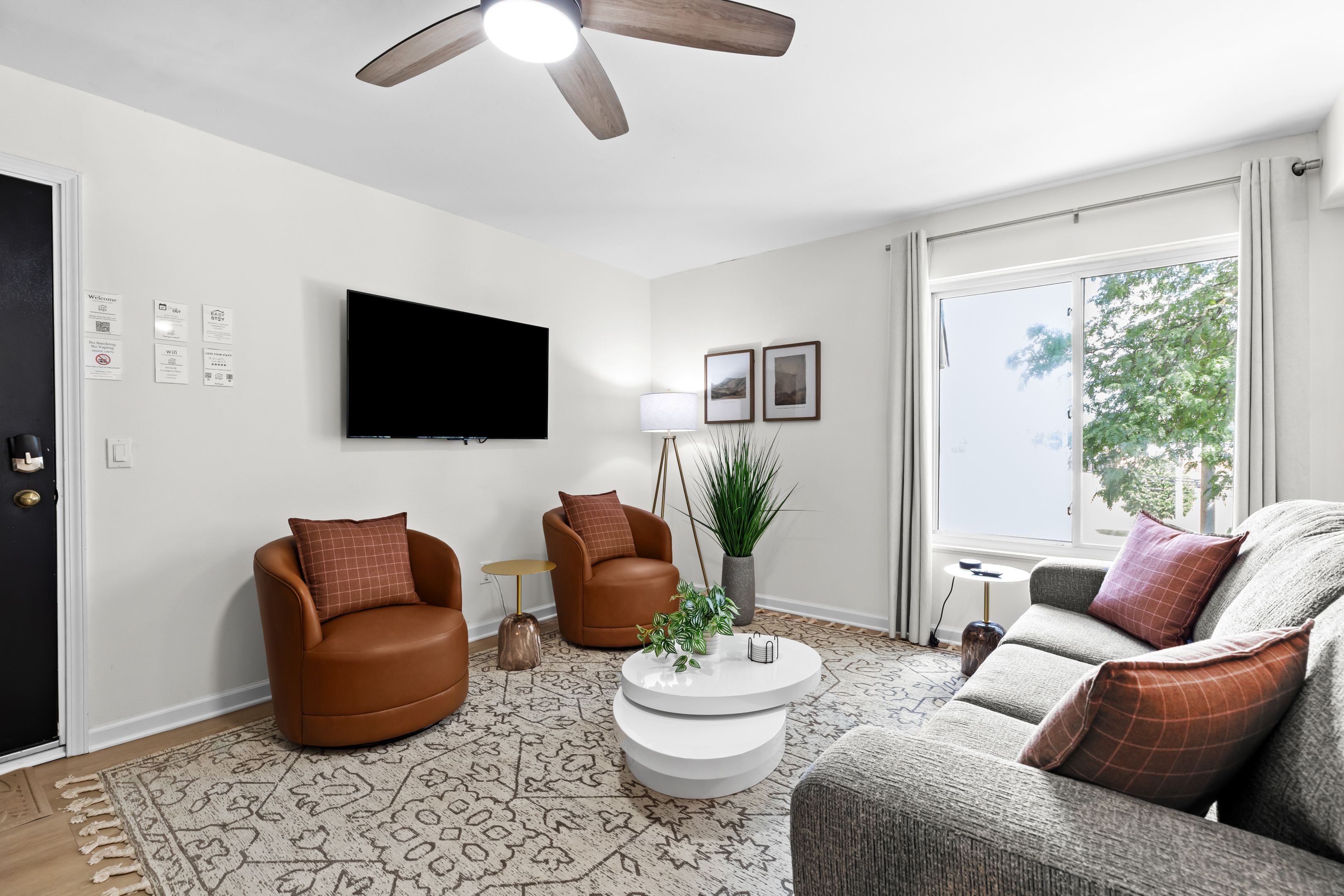 Two modern armchairs set around a coffee table for intimate chats.