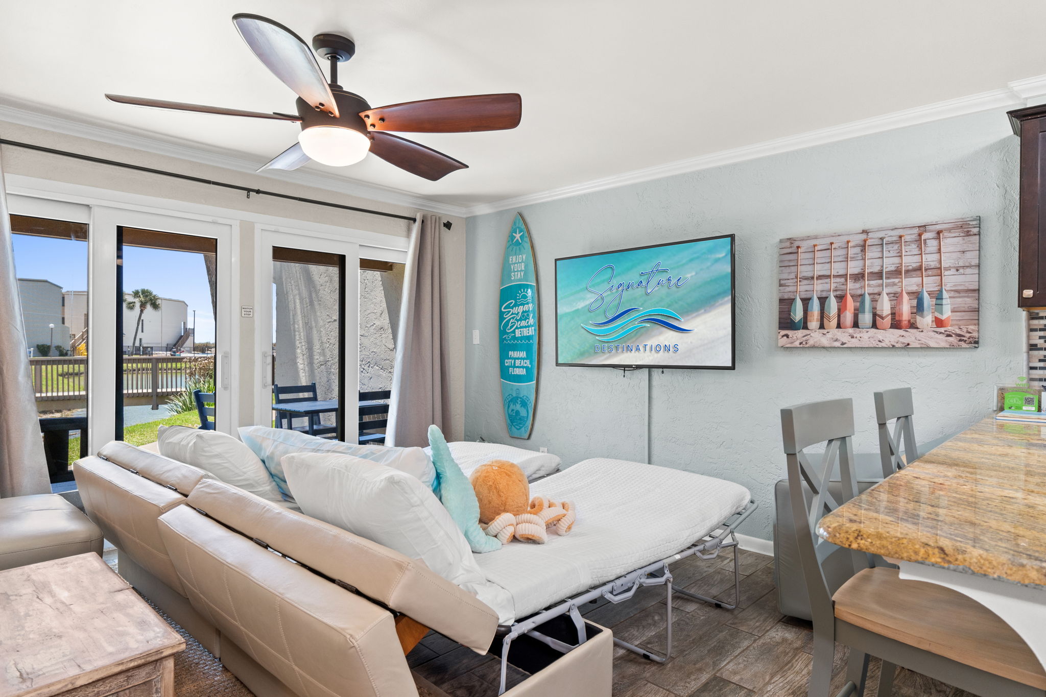 Living Room with 2 Twin Pullout Ottoman Beds