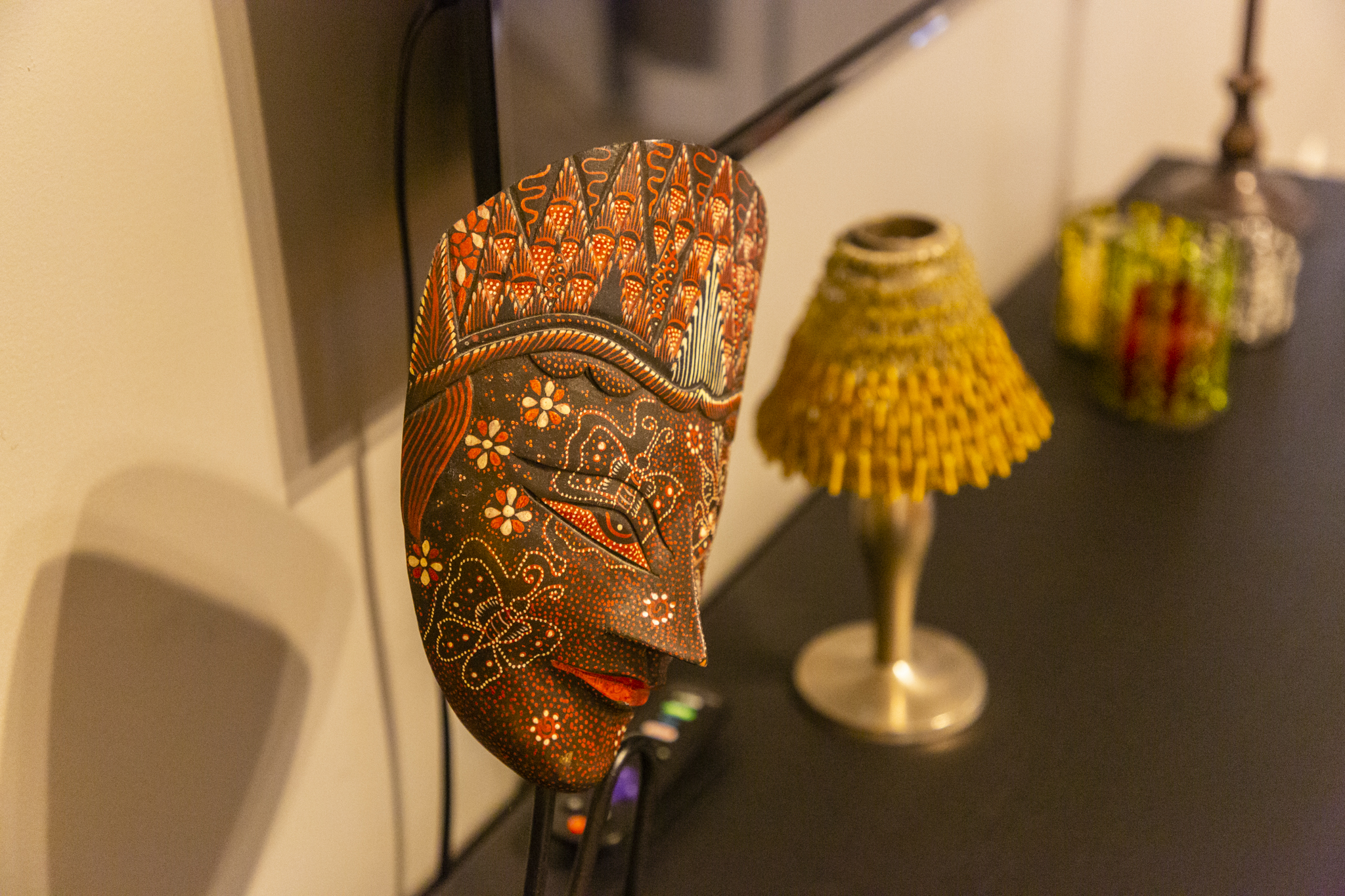Unique African-inspired décor adds warmth and character to the room’s design.