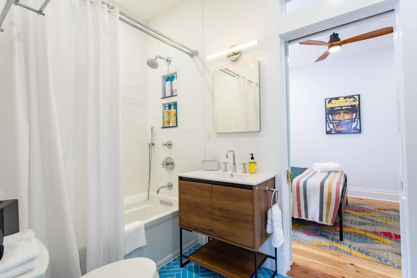 A full bathroom featuring a relaxing bathtub, with convenient access directly from the bedroom, offering a seamless flow and a luxurious, spa-like experience.