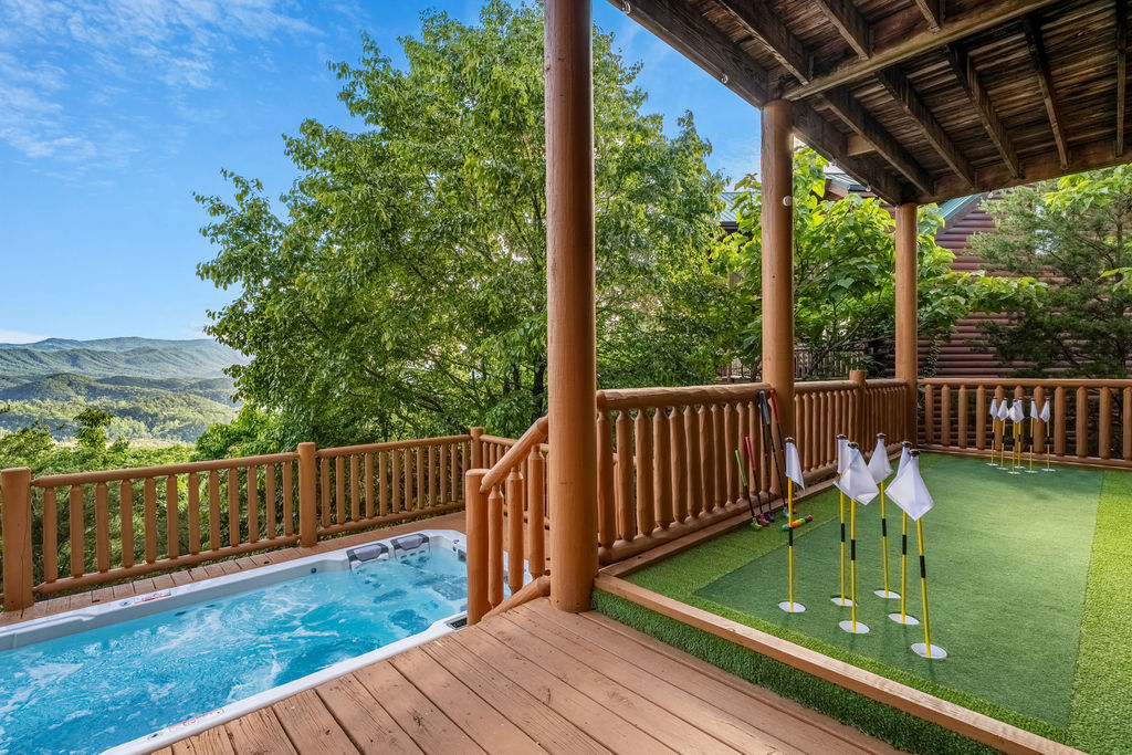 Enjoy a mountain view soak in the private swim spa, then tee off for a round of putt-putt&mdash;fun and relaxation all in one unforgettable deck experience.