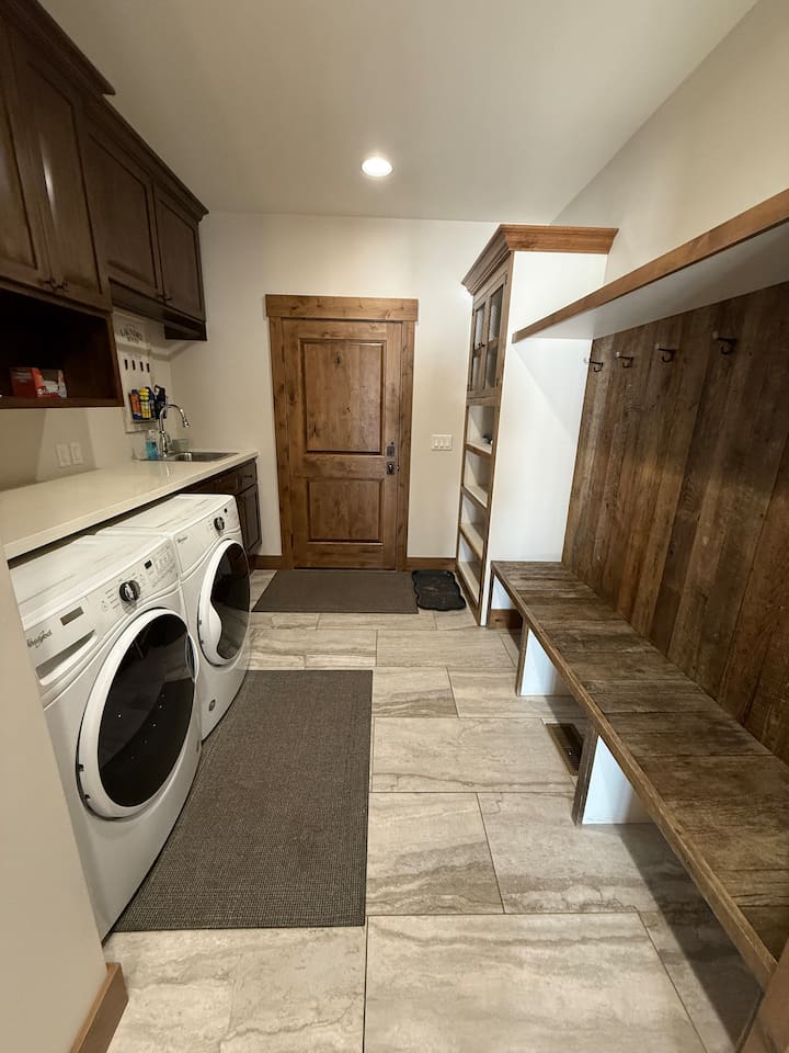 laundry detergent, dryer sheets, iron and ironing board provided 
