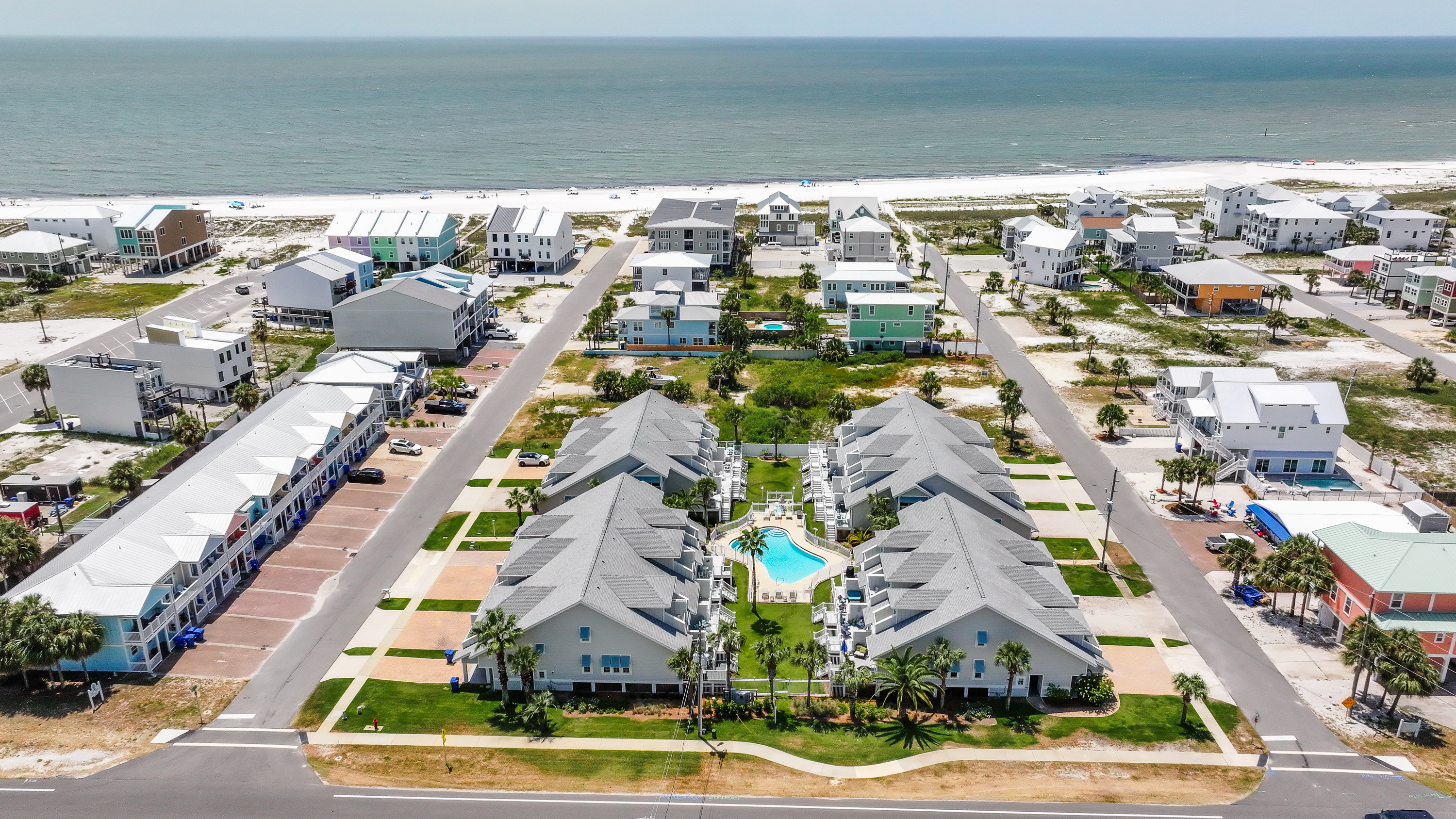 Aerial view showcasing our unbeatable location just a short walk from the beach and community pool