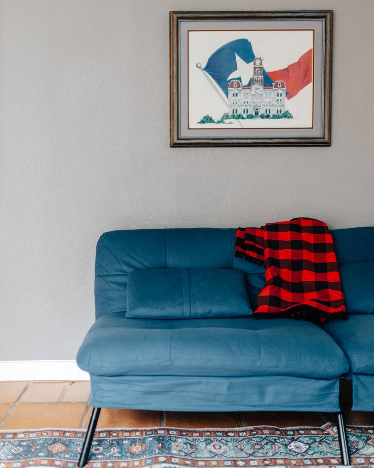 additional comfortable sofabed in living room.