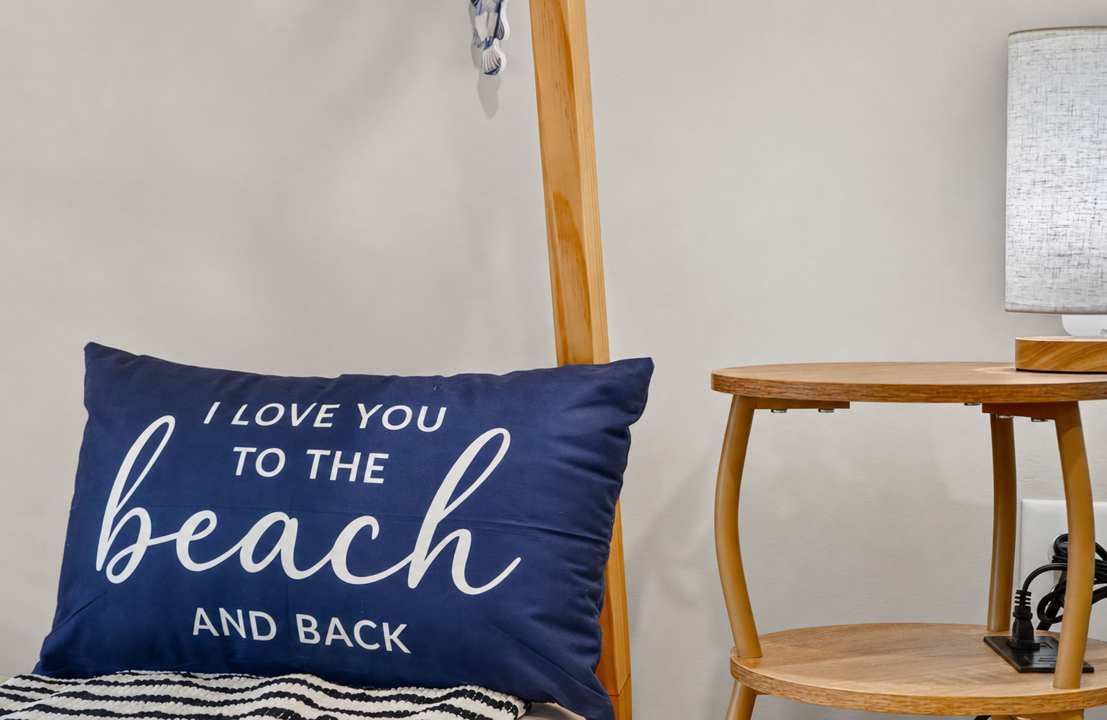 Charming beach-inspired details bring a playful coastal feel to the room.