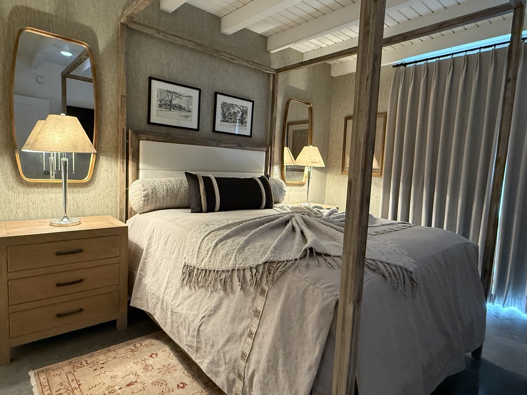 Queen Master Bedroom with access to back courtyard.