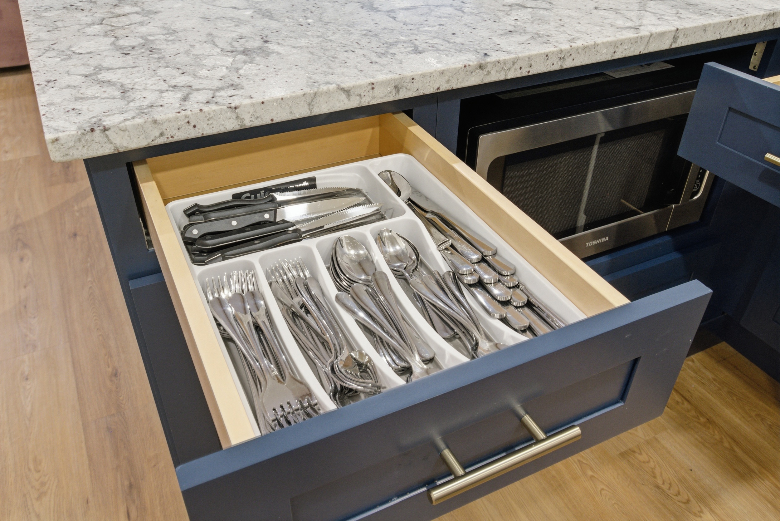 Fully stocked silverware and utensil drawers. Everything included for group cooking and game day meals.