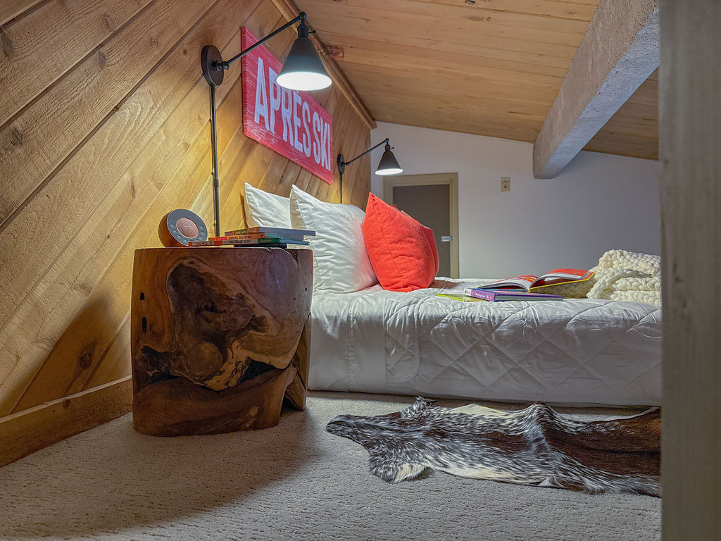 The loft is a cozy space with a luxury king sized mattress...