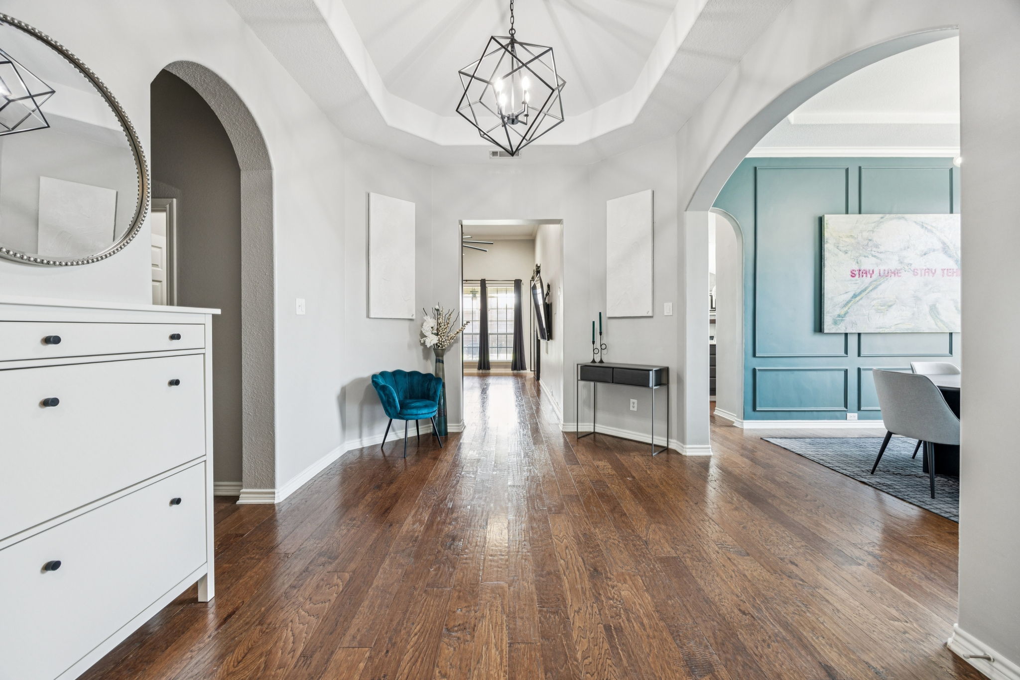 Welcoming foyer with open sightlines into the heart of the home.