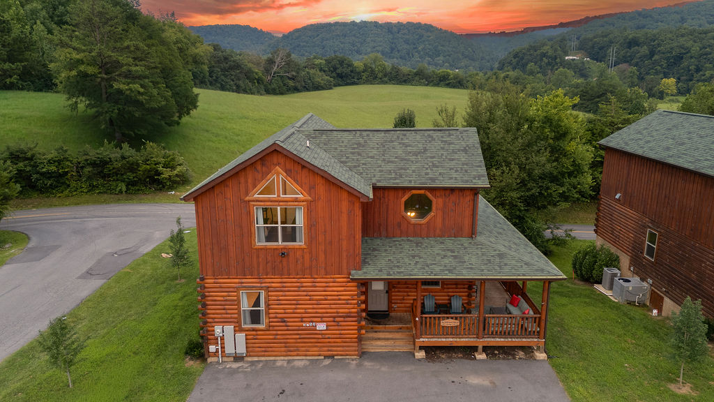 Custom log cabin with a wrap around porch and view- YES!