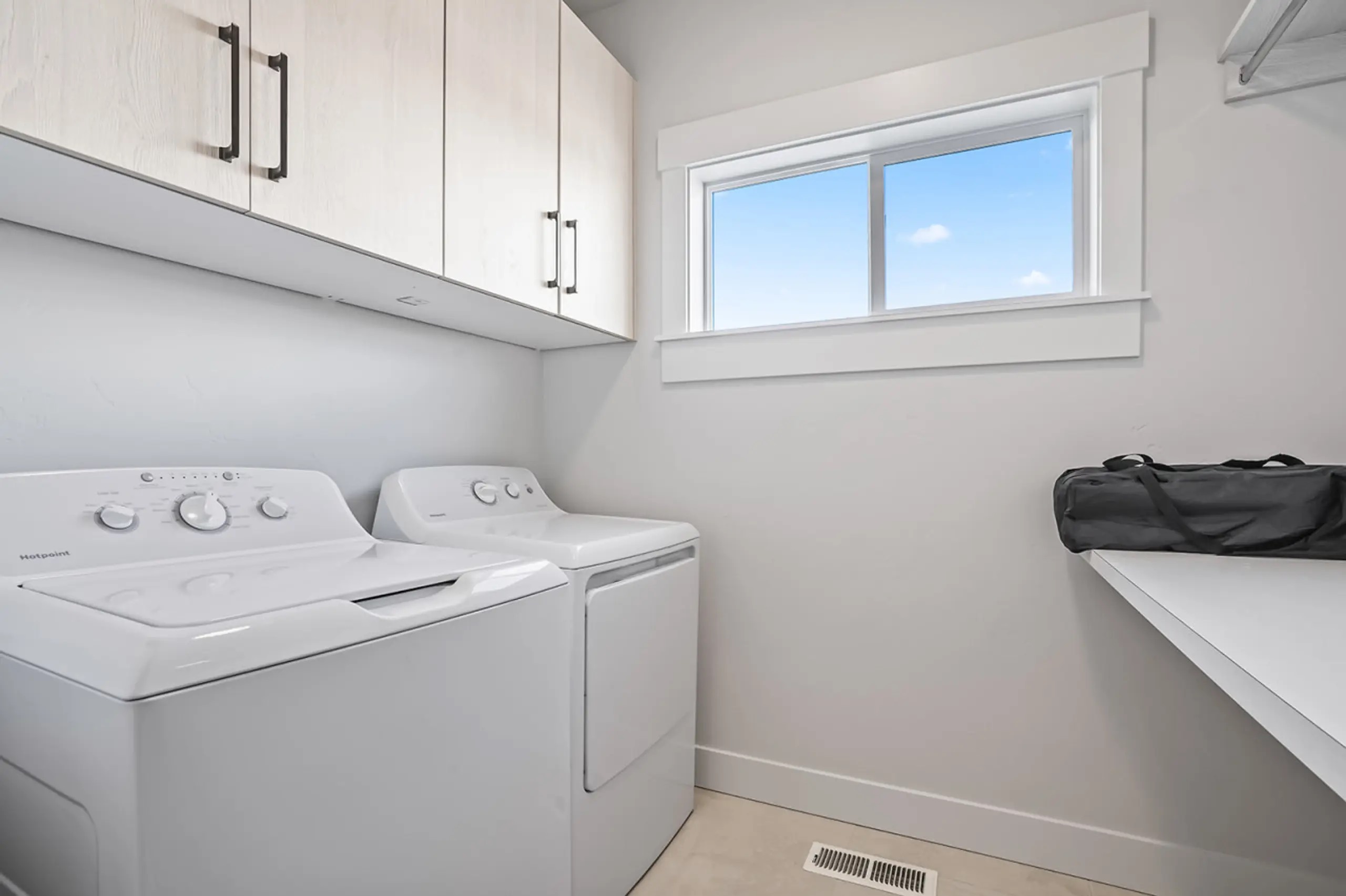 Full washer and dryer included for your convenience.